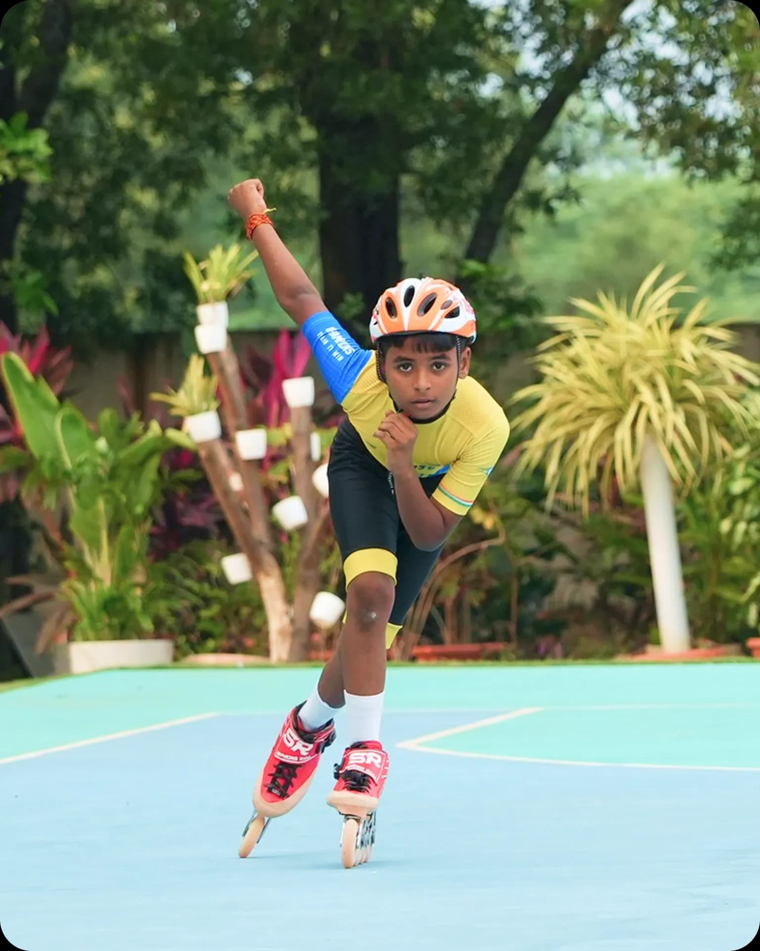 Girl skating with helmet